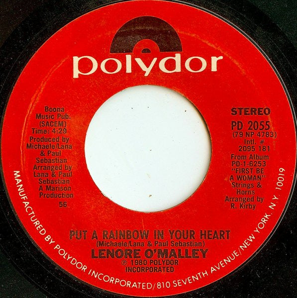 Lenore O'Malley : First... Be A Woman / Put A Rainbow In Your Heart (7", Single, Styrene, 56 )