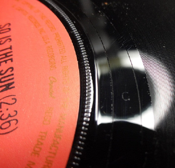 World Column : So Is The Sun (7", Single, Promo, RE)
