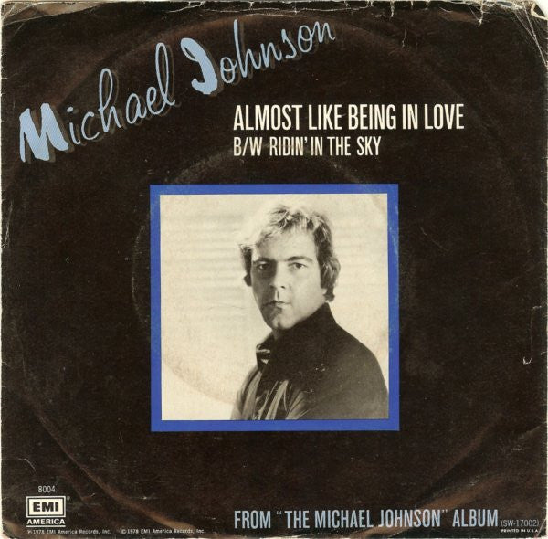 Michael Johnson (5) : Almost Like Being In Love (7", Single, Win)