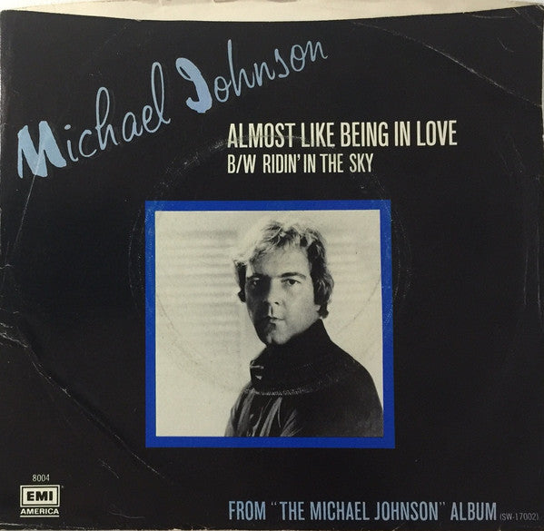 Michael Johnson (5) : Almost Like Being In Love (7", Single, Win)