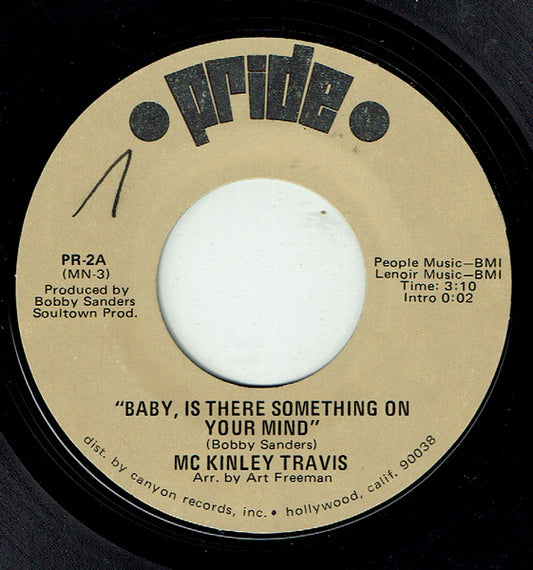 McKinley Travis : Baby Is There Something On Your Mind  (7", Styrene, Mon)