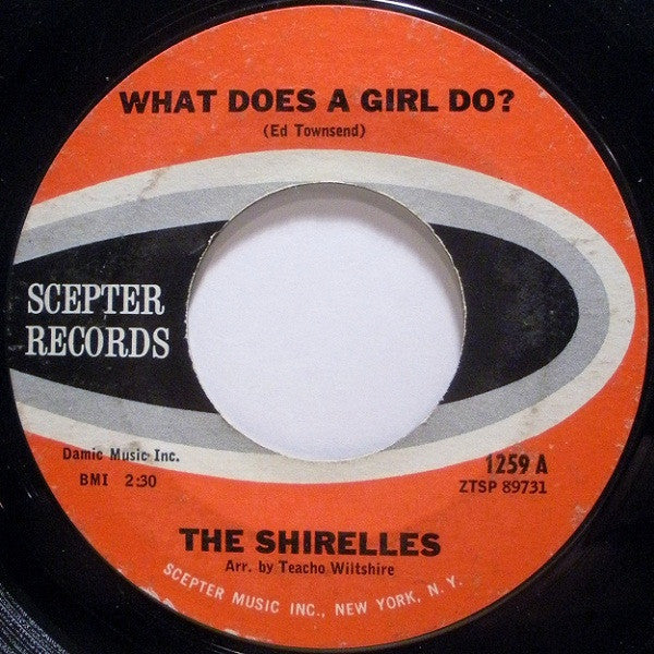 The Shirelles : What Does A Girl Do? (7", Single)