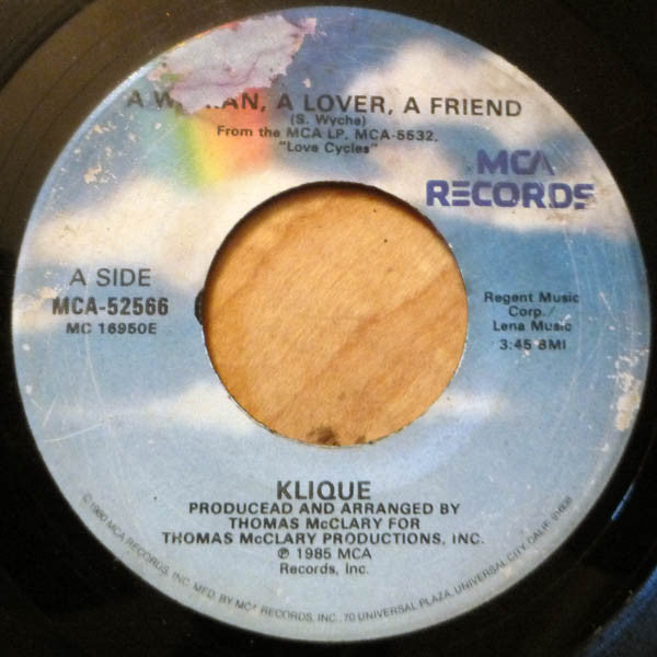 Klique : A Woman, A Lover, A Friend / Another Day Another Night (7", Single)