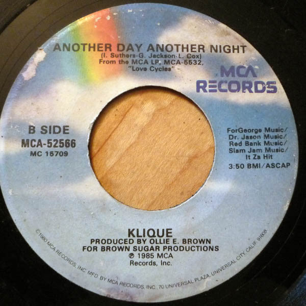 Klique : A Woman, A Lover, A Friend / Another Day Another Night (7", Single)