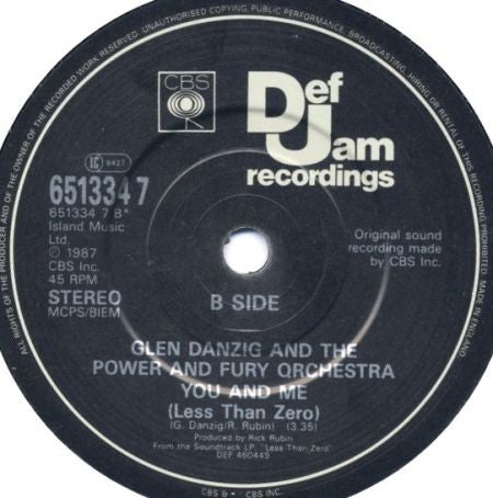 The Black Flames / Glenn Danzig And The Power And The Fury Orchestra : Are You My Woman? (From Less Than Zero) / You & Me (Less Than Zero) (7", Single)