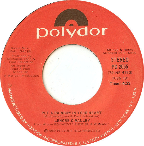 Lenore O'Malley : First... Be A Woman / Put A Rainbow In Your Heart (7", Single, 18 )